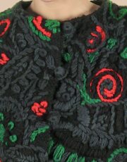 Black wool. embroidery (fragment)